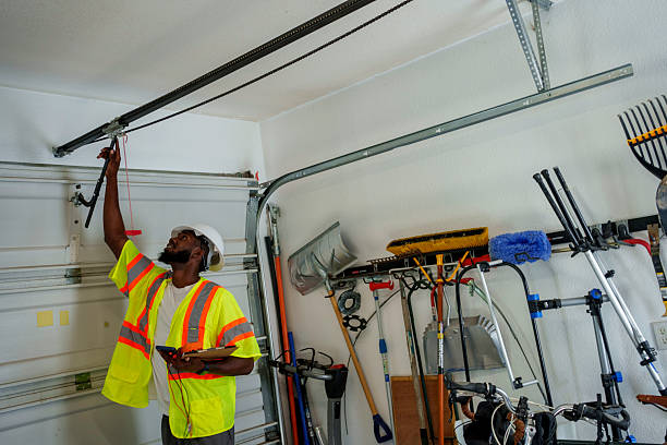 Professional Garage Door technician working in Raymond, IL